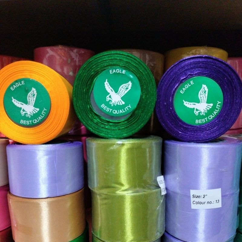 

COD PITA SATIN 2 INCH EAGLE BRAND - 5 CM PITA SOUVERNIR - EAGLE BRAND KADO HEMPERS PARSEL HANTARAN - PERROLL 18 M