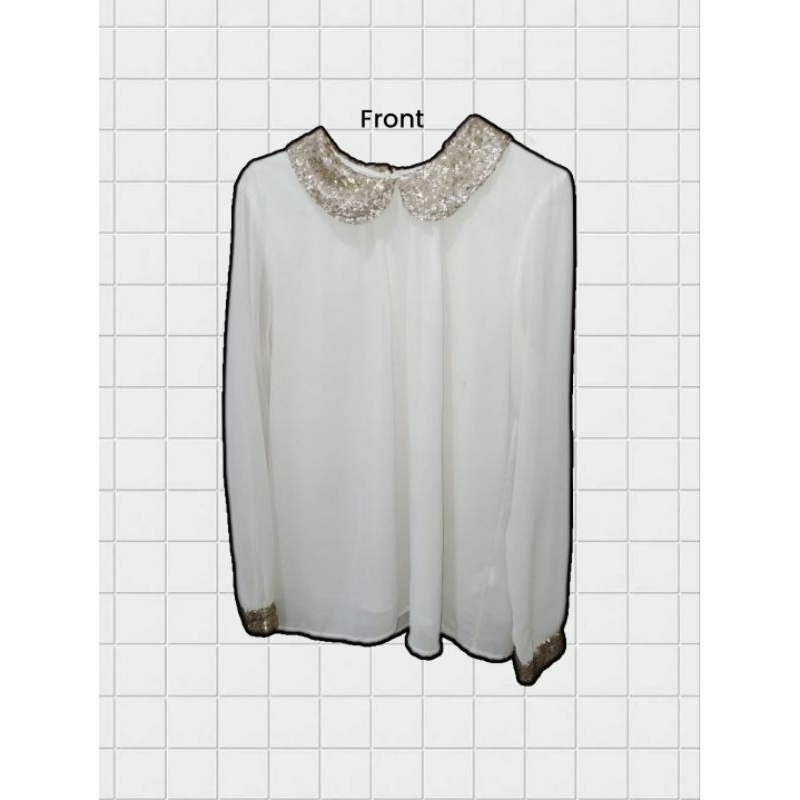 atasan putih st Yves