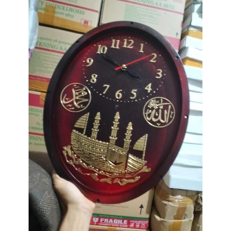 JAM DINDING KALIGRAFI OVAL TANPA KACA