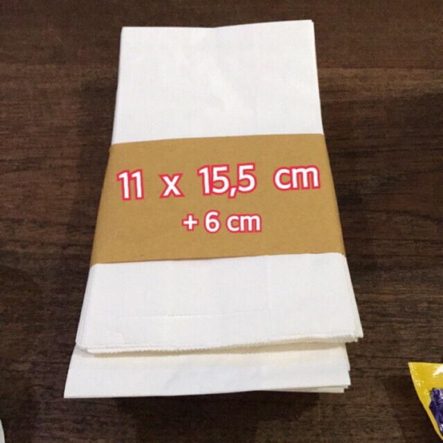 

Kantong Kertas Paperbag 11cmx15.5cm+6cm isi 100lbr