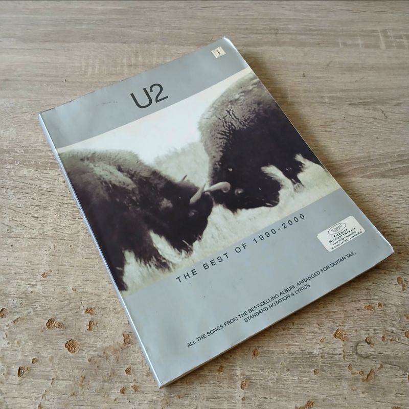 buku musik notasi dan lirik grup band U2