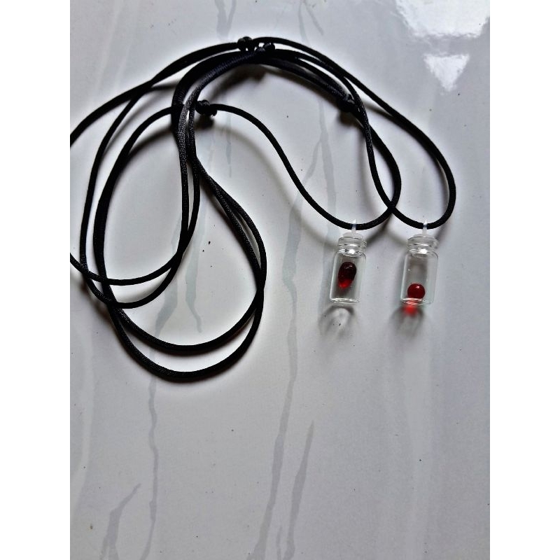 kalung botol mustiko lipan merah delima