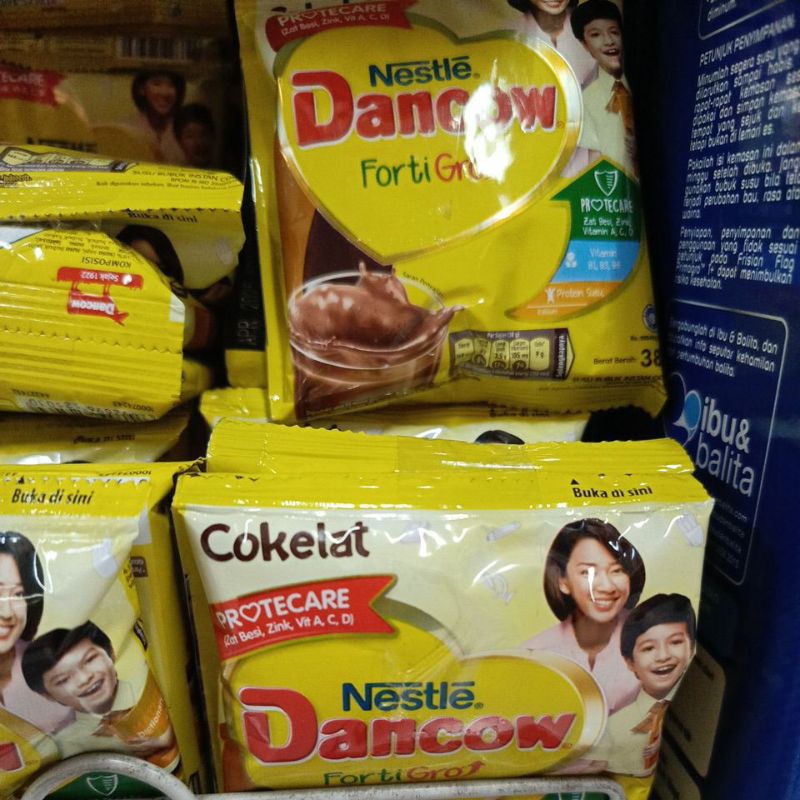 

dancow sachet isi 4 untuk anak usia sekolah