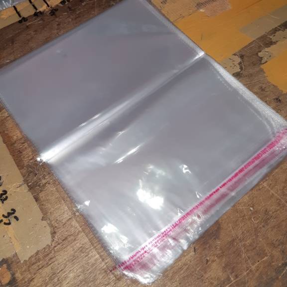 

KP8 1 LEMBAR Plastik OPP lem 25 x 35 cm 4 plastik lem seal king