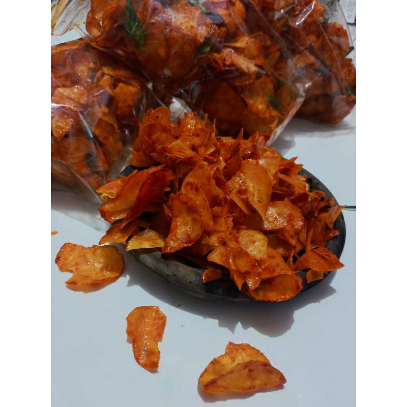 

Keripik Singkong Lengket Rasa Pedas Daun Jeruk 250 gr