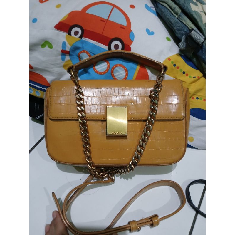 preloved sling courune