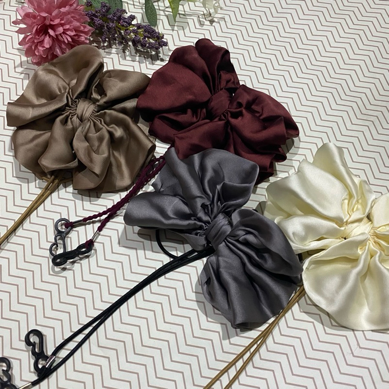 conector masker hijab bentuk pita