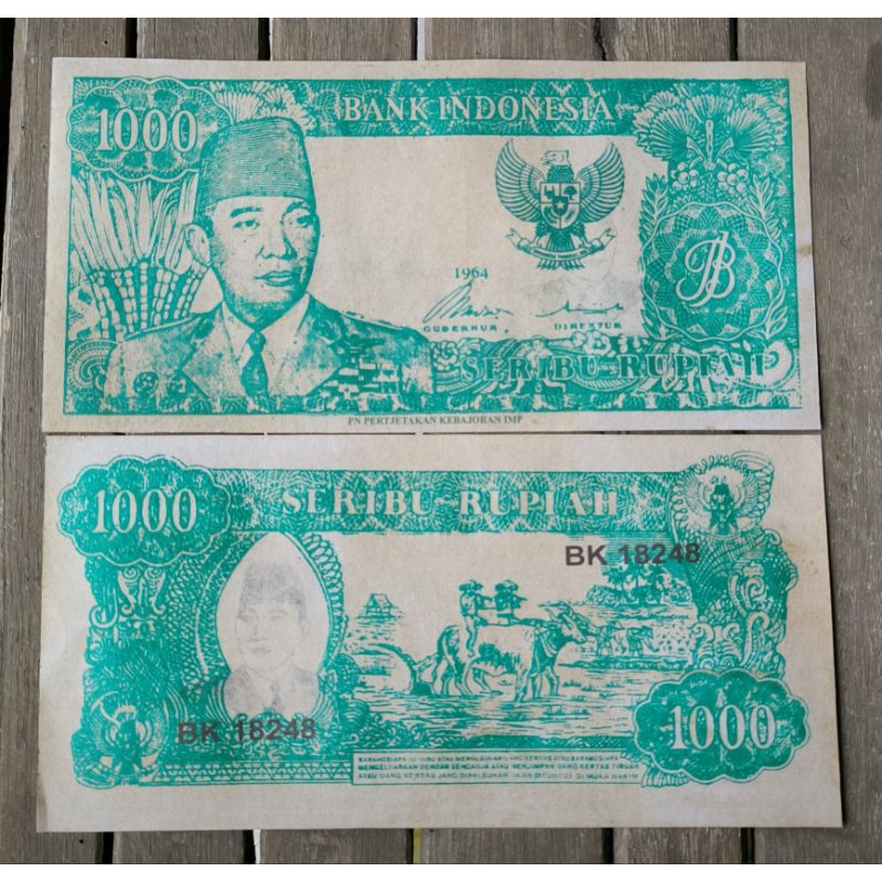 Uang souvenir 1000 Sukarno melengkung 1964 gambar belakang petani naik kerbau berseruling kerbau baj