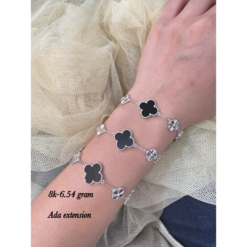 Gelang rantai bunga hitam mas putih