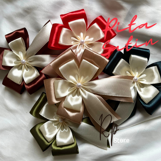 

Pita Satin Double , Pita Jadi, Pita Hampers, Pita Souvenir, Pita Kado