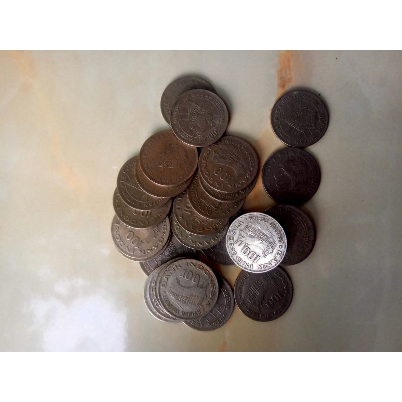 koin 100 gambar wayang tipis