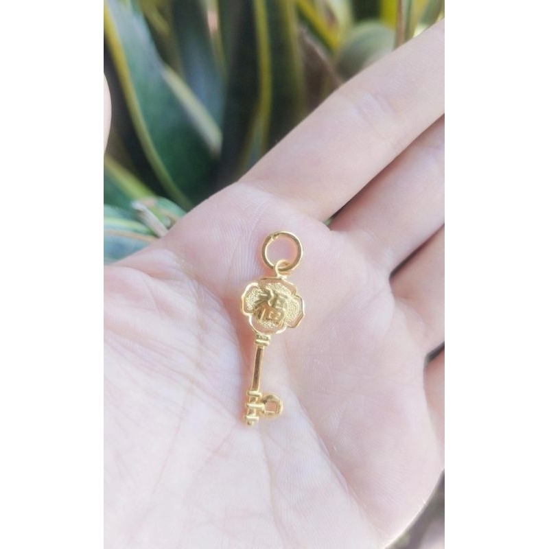 liontin kunci emas 99