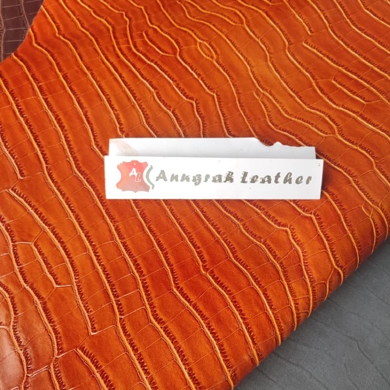 Kulit Sapi Asli Motif Buaya ( Tahu ) / Croco Perut Warna Tan Ketebalan 1.5 mm