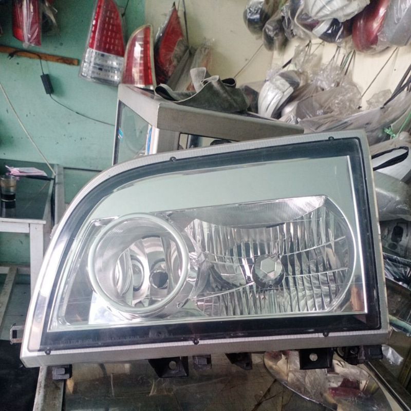 Headlamp / lampu depan Isuzu Elf macan sebelah kiri original