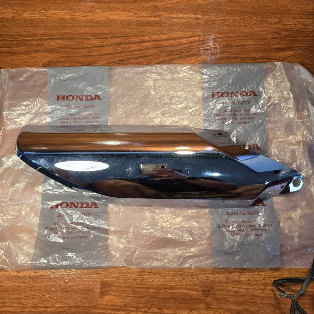 Tutup Knalpot (Cover Muffler) – Mega Pro FI cover knalpot besi 18311KYE940 asli ahm