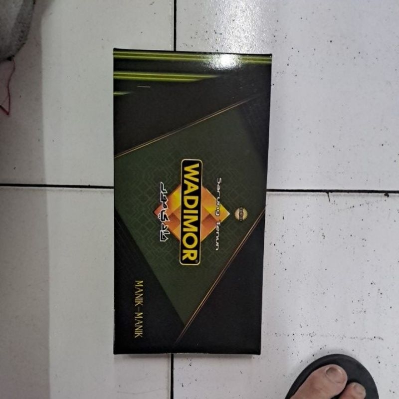 sarung wadimor motif manik-manik