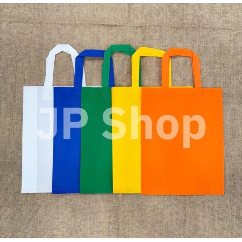 

Tas Spunbond 30x40x10 cm Tas Belanja Goodie Bag Polos Berwarna