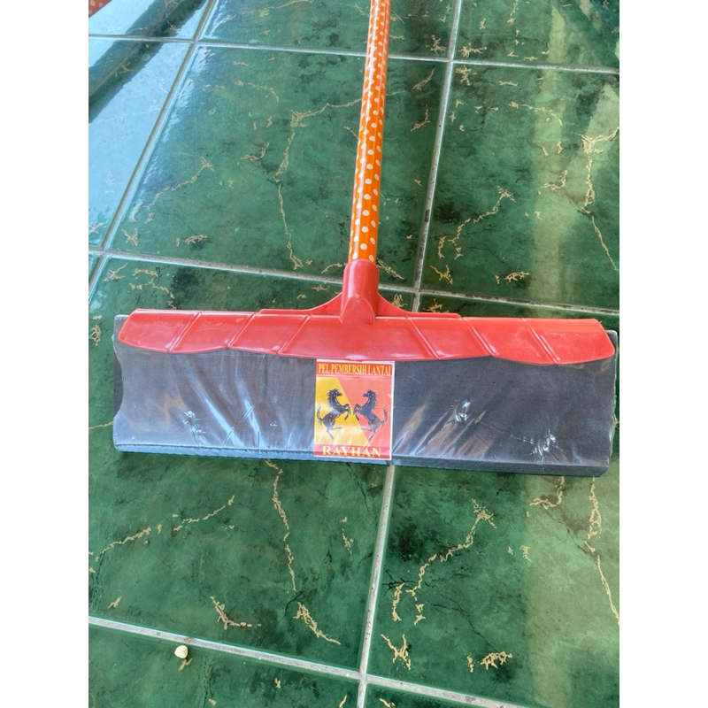 Pel karet serokan air lantai