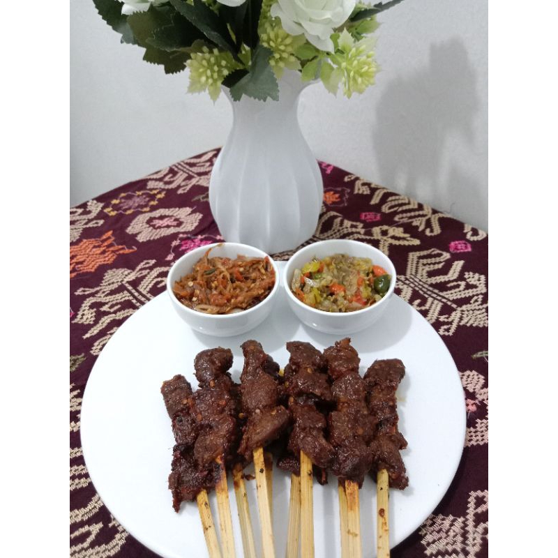 

Sate Babi Bali (harga untuk 1 porsi isi 10 tusuk)