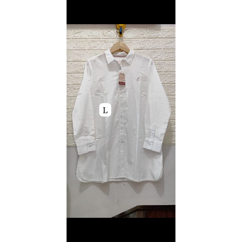 Kemeja Putih corniche