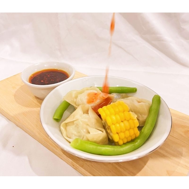 

HALAL.. Pangsit ayam frozen by dapoernya wulan