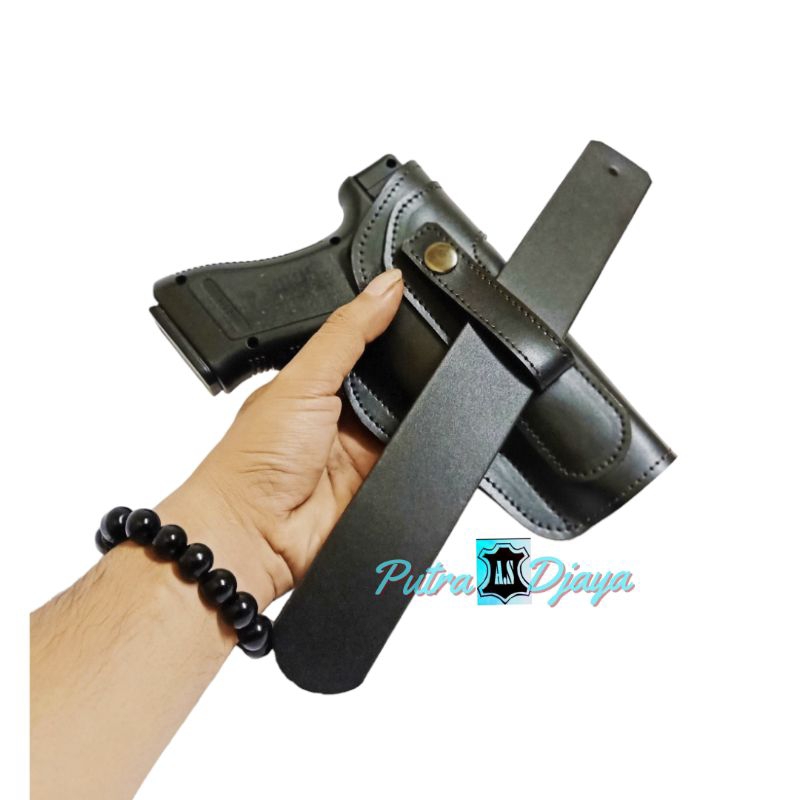 Sarung pistol glock slip pinggang dalam tersembunyi.