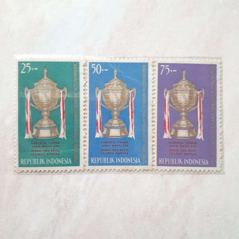 

(A) Perangko Indonesia Thomas Cup Tahun 1964 set lengkap 3pcs