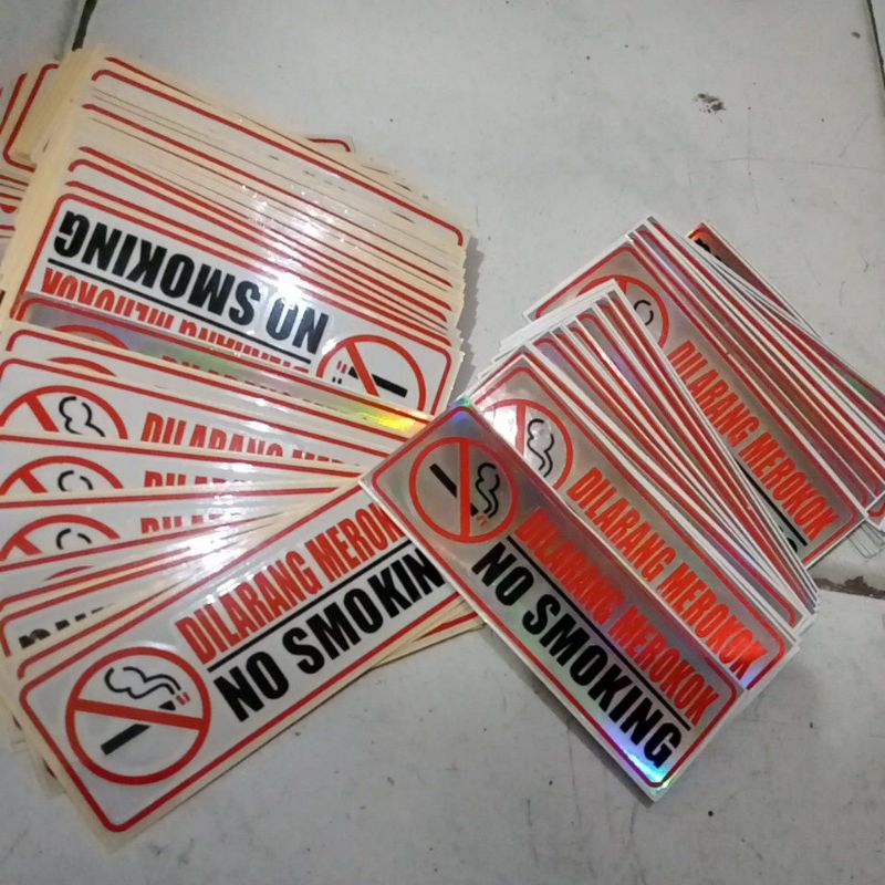 

STICKER CUTTING BAHAN NYALA DI LARANG MEROKOK UK 12cmX 5 cm putih dan hologram