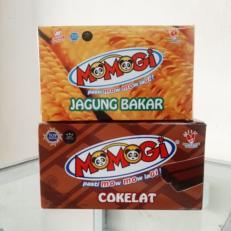 

Momogi 1 Box Isi 10 bks x 12g Rasa Jagung Bakar Cokelat Makanan Ringan Stick Asin Manis Enak Renyah Halal BPOM Hampers Snack Cemilan Anak Murah Makassar Eceran Seribu