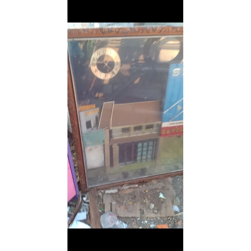 jam pigura 3d lawasan