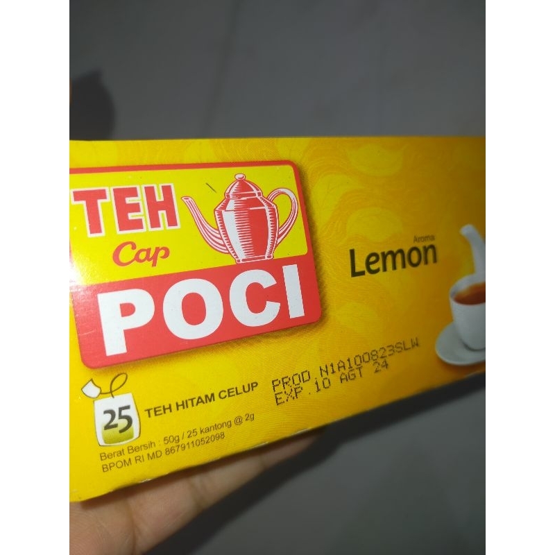 

Teh Poci Hitam Celup Rasa Lemon Kemasan Box Isi 25 Kantong