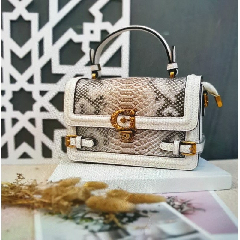 Tas Gusachi motif ular