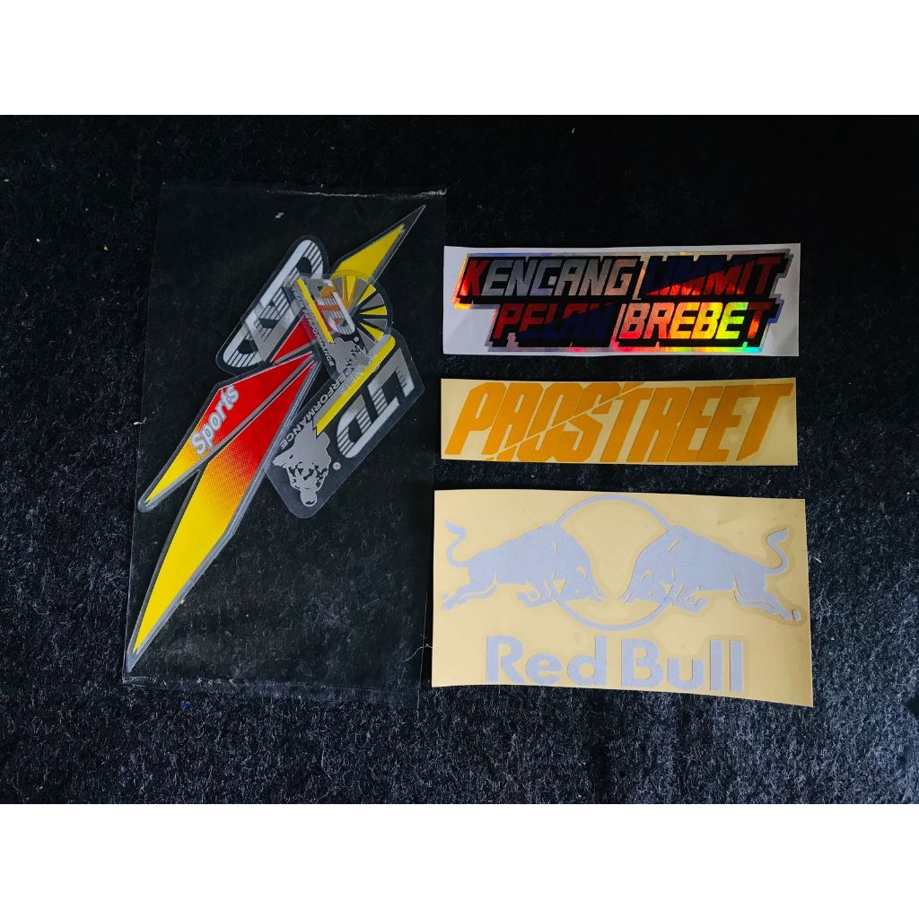 PROMO STIKER GAMBAR LTD KUNING TRANSPARAN ,KENCANG LIMMIT HOLOGRAM,PROSTREET KUNING,REDBULL PUTIH MU