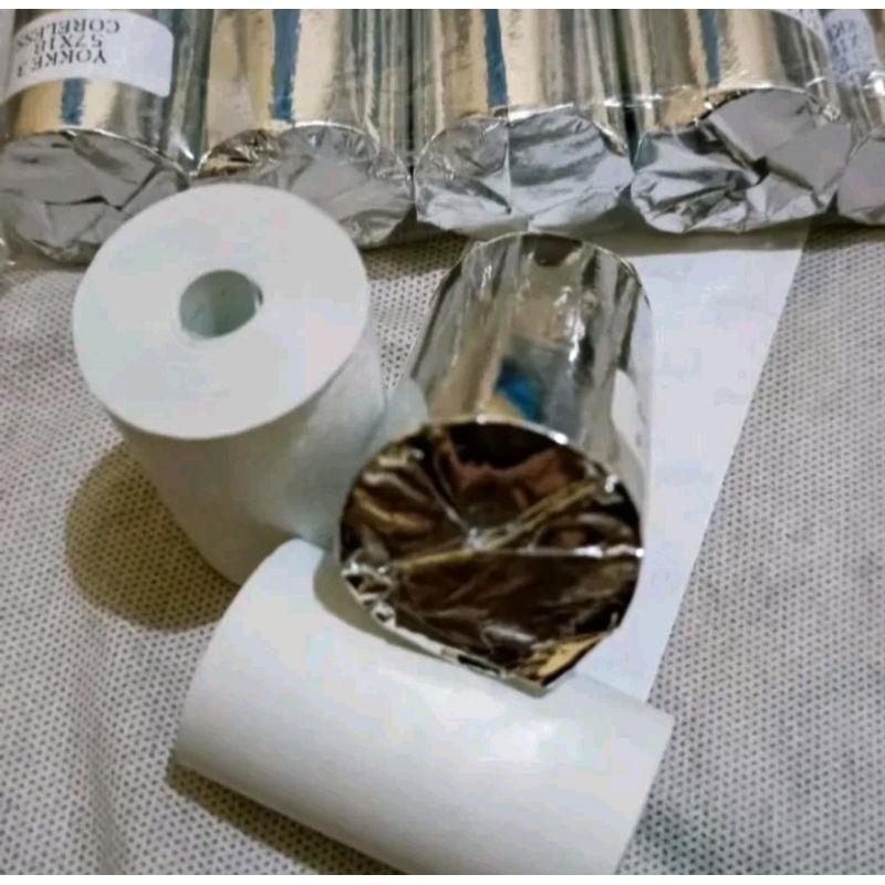 

kertas kasir thermal ukuran 58x40mm full Tampa tulang tengah panjang kertas 18 mtr