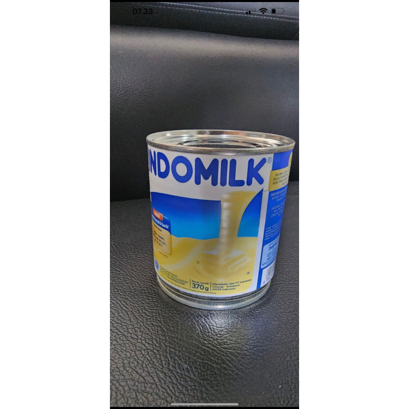 

Susu Kental Manis Indomilk kaleng putih