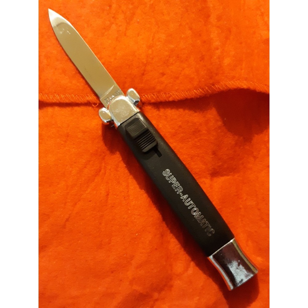 Pisau otomatis menggunakan on off bahan stainless steel