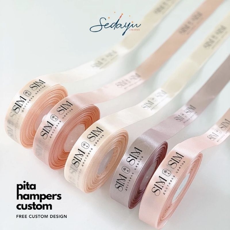 

Label Pita Costume | Label Pita Satin Roll | Label Pita Logo Costume | Label Pita Bucket Bunga | Label Pita Packaging Free Design