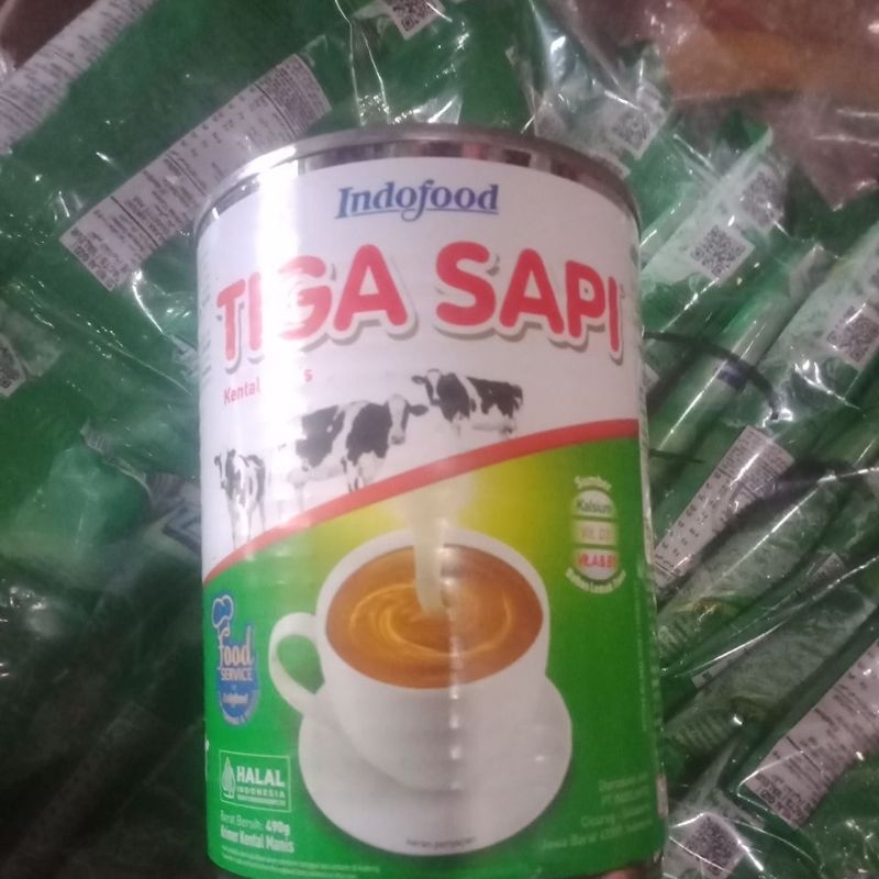 

Susu tiga sapi putih