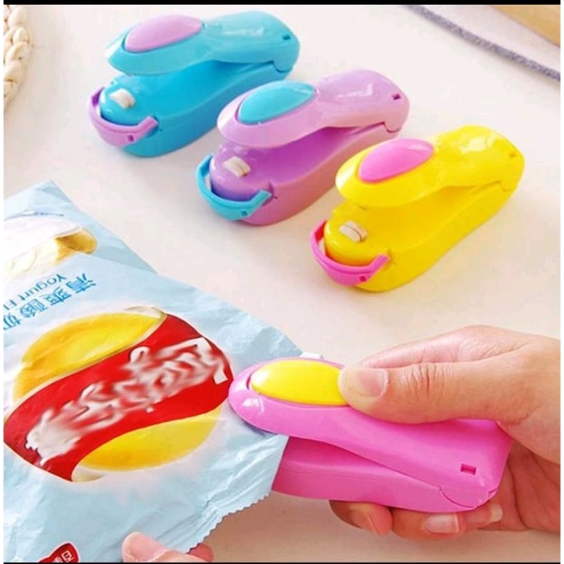 Alat pres mini elektrik/perekat plastik snack makanan/mini hand sealer
