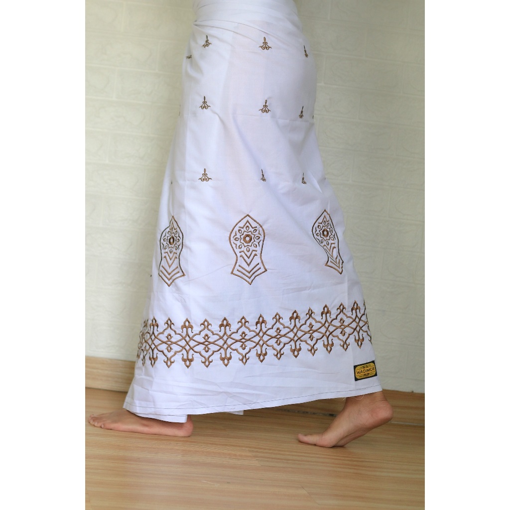 Wadimor- Sarung Bordir Warna Putih motif trompah bali gayo dan sultan