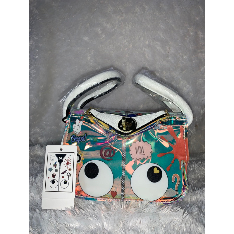 tas import mata hologram size mini