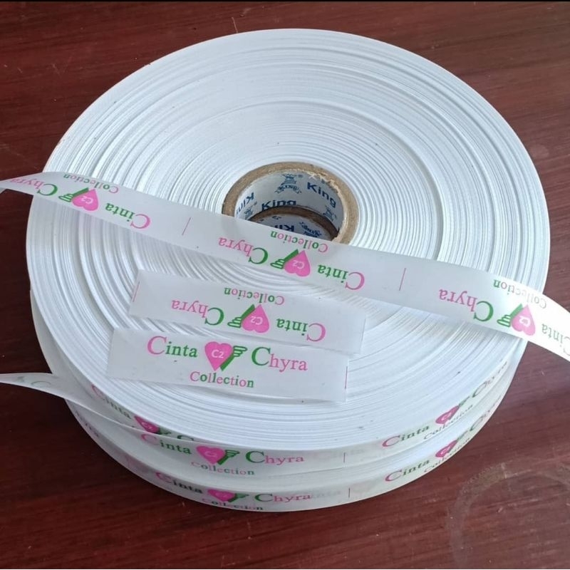 

satin label baju putih lebar 2cm minimal 50lusin