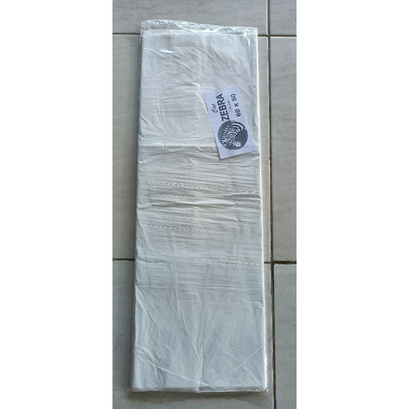 plastik layang layang papiran putih susu(dof) tebal 0,007 , lebar 120cm panjang 50meter(zebra)