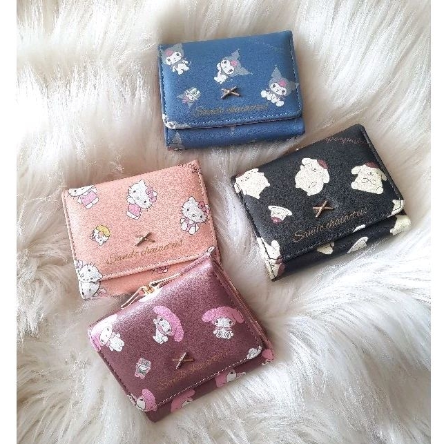 Dompet lipat behel karakter