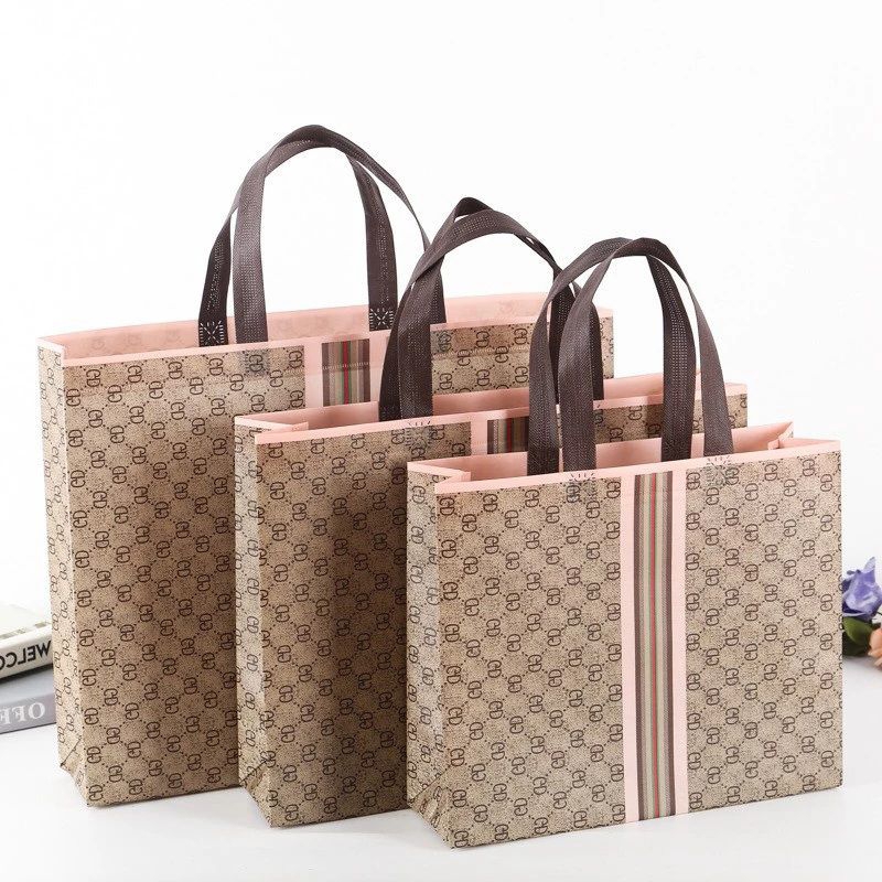 

PAPER BAG KAIN MOTIF TAS BELANJA BAHAN SPUNBOUND / TAS HAMPERS