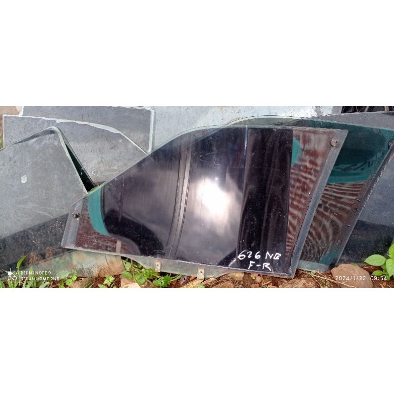 kaca pintu depan kanan mazda 626 capella HB
