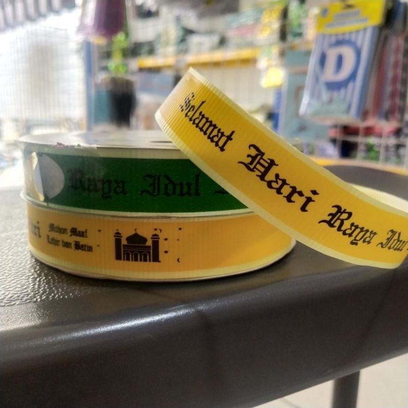 

Pita Dop Roll tulisan " Selamat Hari Raya Idul Fitri" ukuran 2 cm