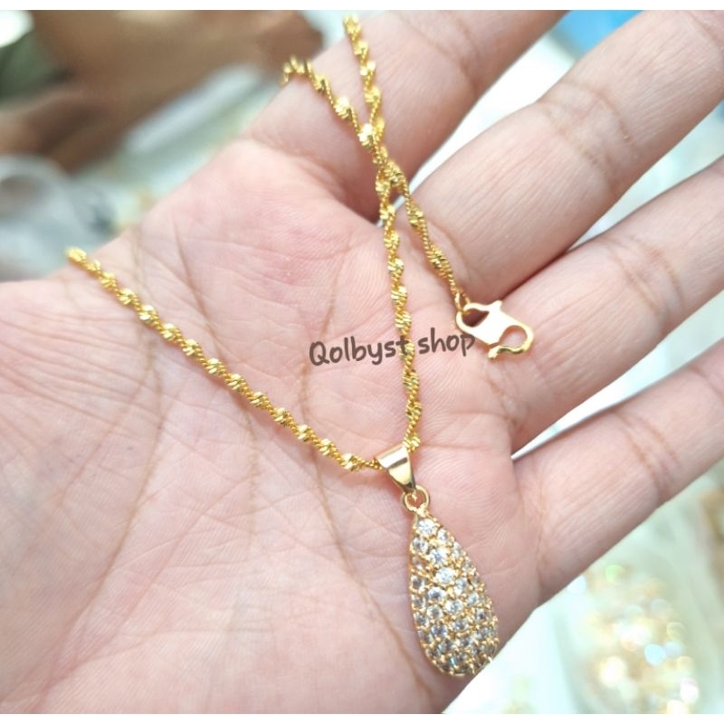 KALUNG MELINTIR LAPIS EMAS 24 KARAT PLUS LIONTIN LABU