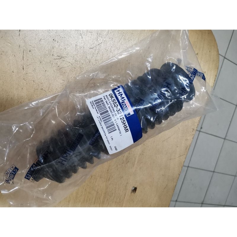 Karet boot rack stir steering kia carnival / sedona