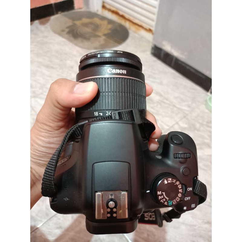 kamera Canon 1300 d bekas seperti baru kelengkapan body camera lensa kit charger dan tas